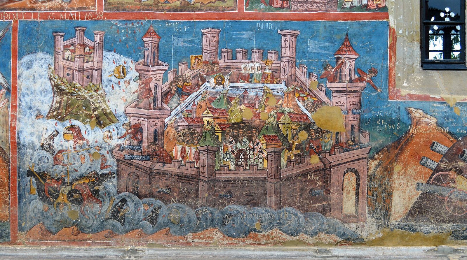 A brightly painted fresco of a walled city on the sea, a procession on the walls and ships and attackers foundering in the waves below.