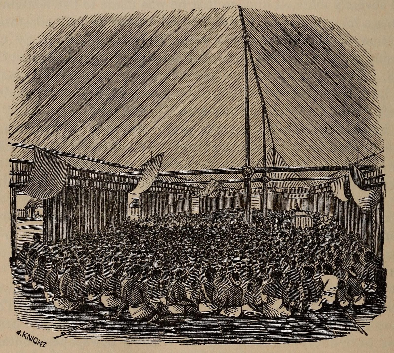 An engraving of a large crowd seated on the floor of a vast thatched building, listening to a preacher.