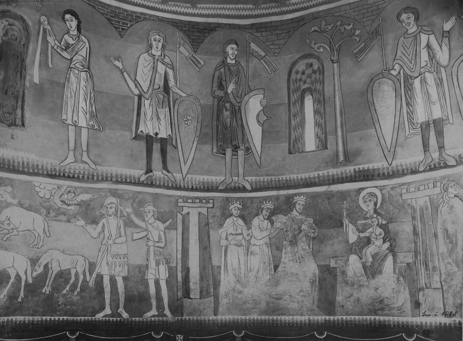 A black-and-white photograph of wall paintings of standing princes in two tiers inside a round chapel.