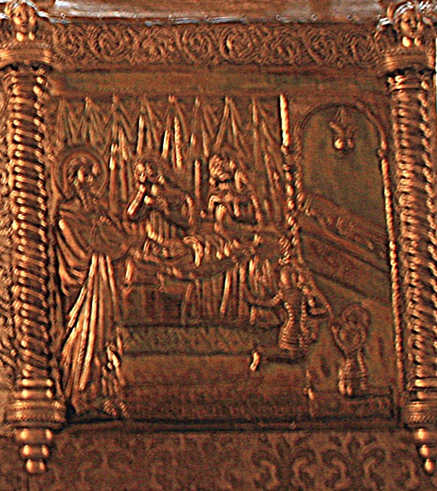 A gilded relief of a man lying on a bed surrounded by mourners, a haloed saint appearing at the right.