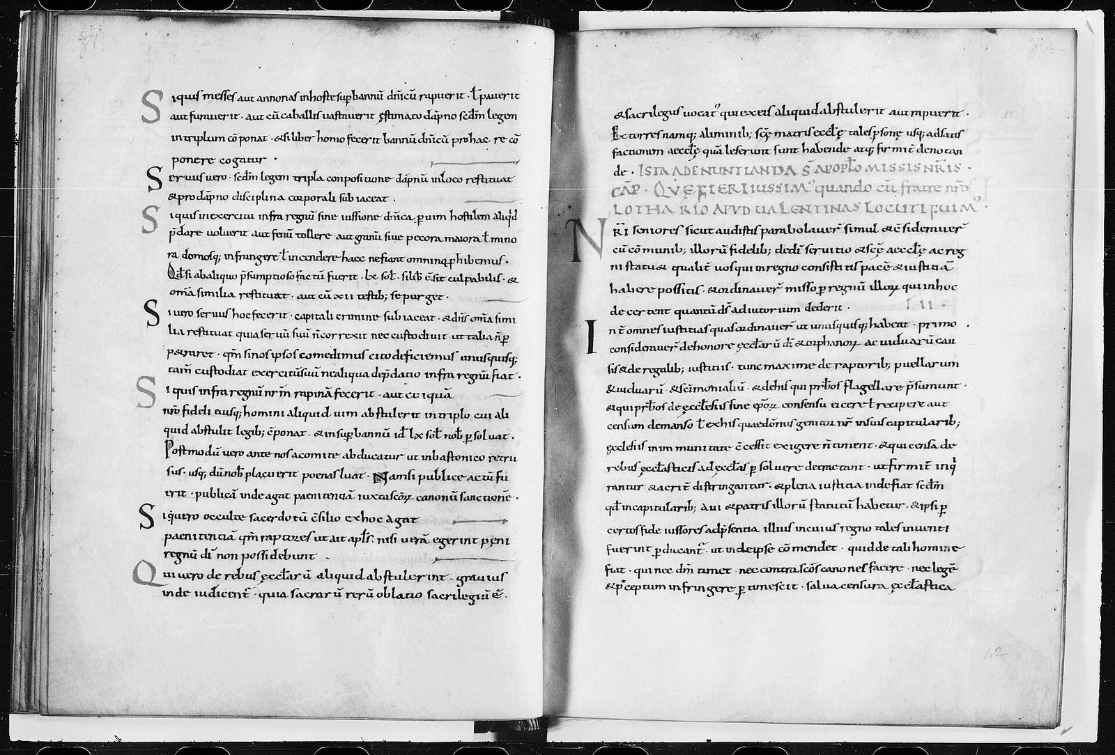 An open early medieval manuscript, both pages ruled in a single column of small Latin hand with short headings and numbers picked out in a darker ink.