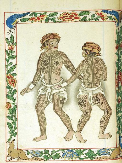 A painted manuscript page in a flowered border: two men in loincloths and headcloths, their bodies covered in dark patterned tattoos.