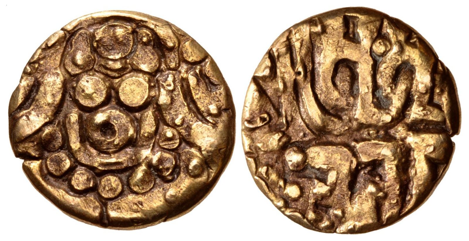 Both faces of a small gold coin, a seated goddess and a Nagari legend.