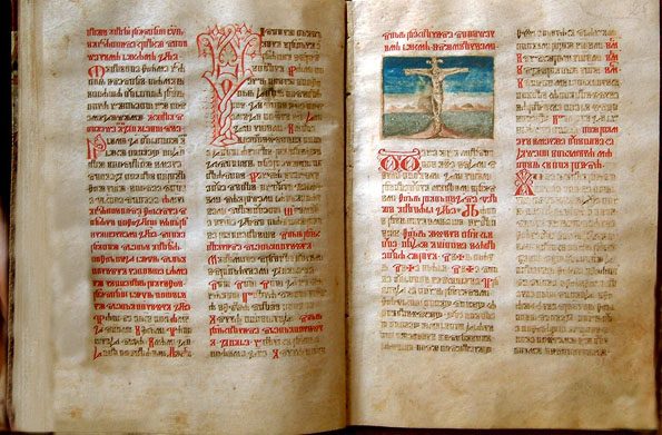 An open manuscript of Glagolitic text in black and red, with a small painting of the Crucifixion.