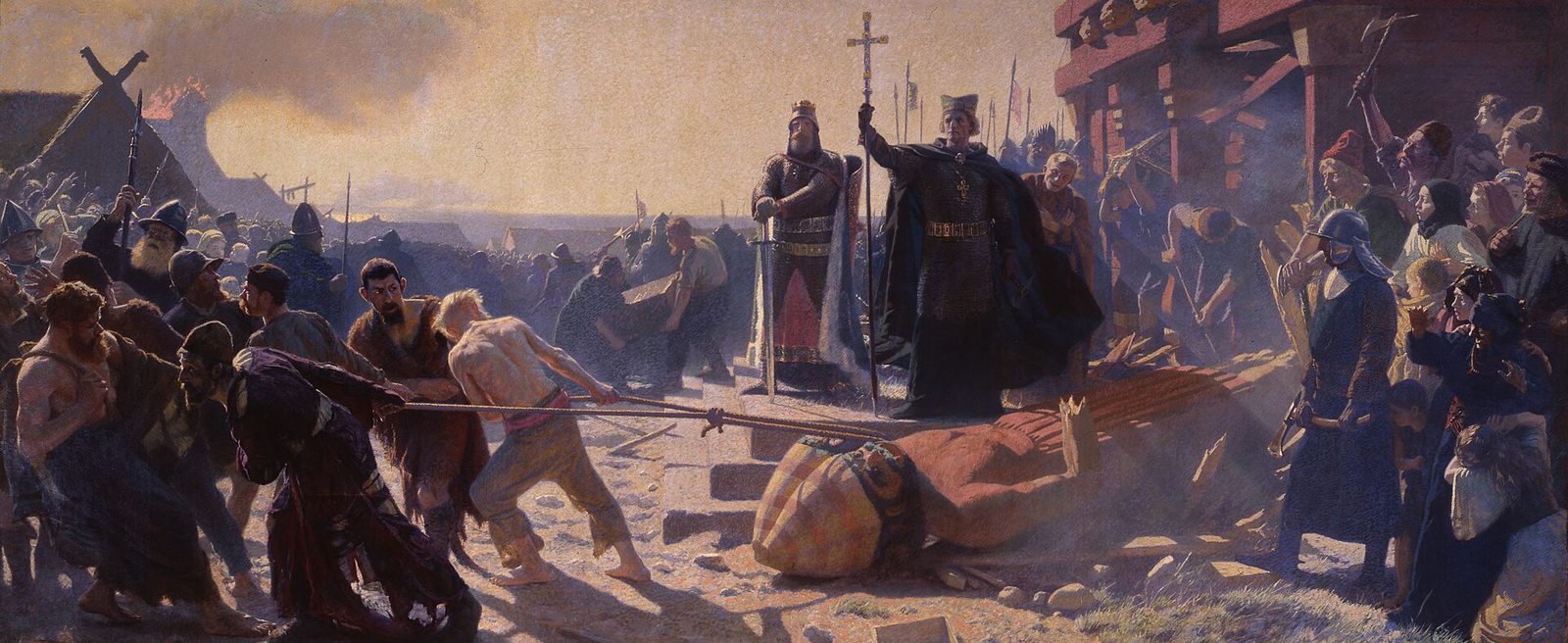 A painting of a crowd hauling down a huge wooden idol with ropes while a bishop in vestments looks on.