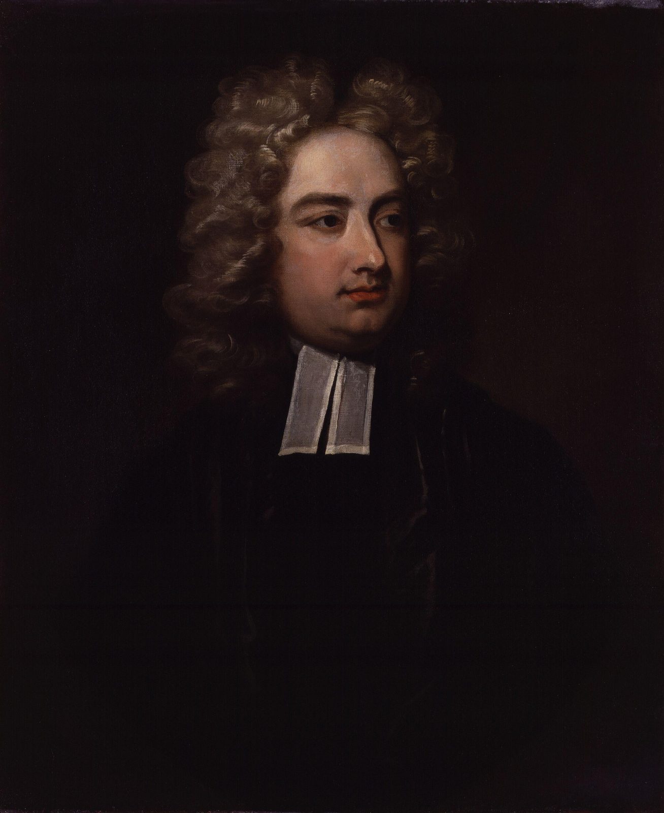 A portrait of a man in a curled wig and clerical bands against a dark background.