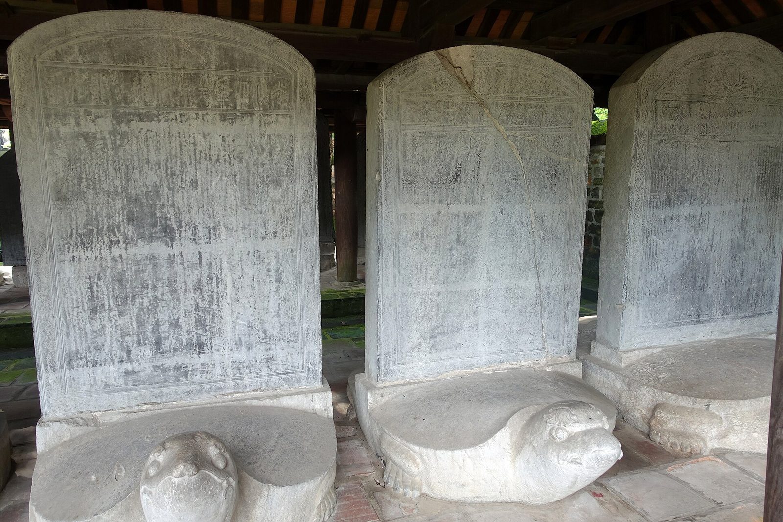 Rows of inscribed stone stelae mounted on carved stone tortoises.