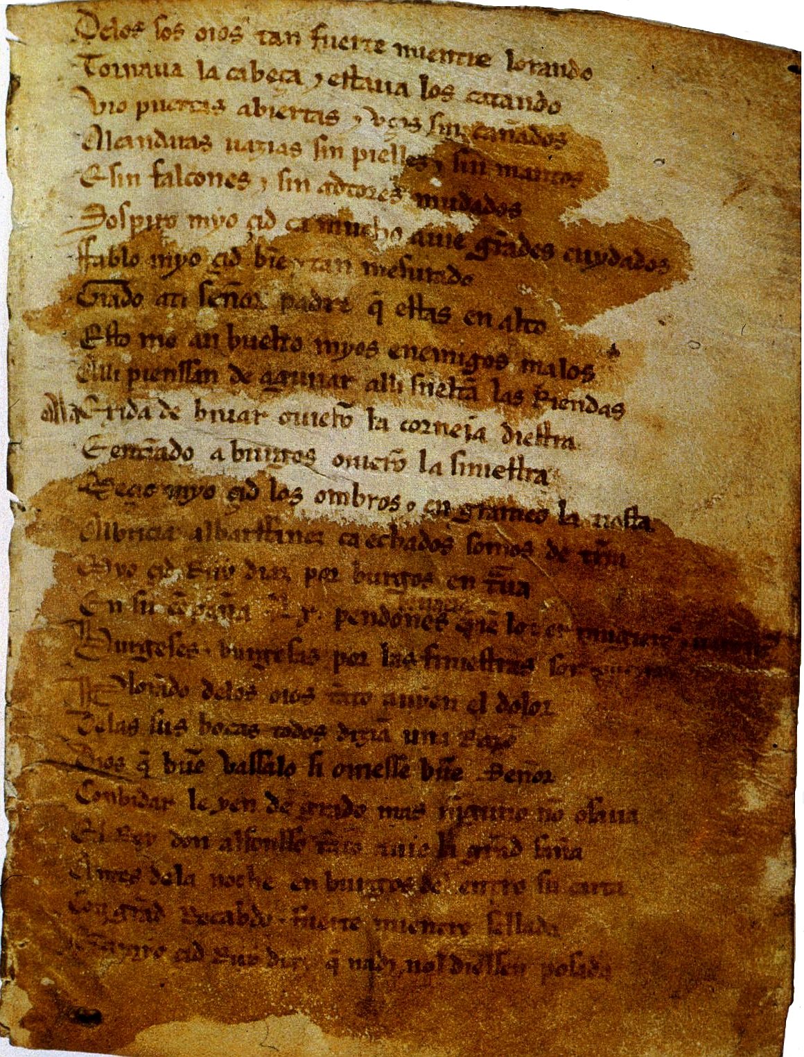 A stained and worn manuscript page of closely written lines in a Gothic hand.