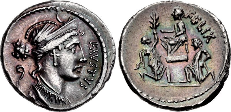 Both faces of a silver coin: a female head, and a seated figure receiving a kneeling man and a bound captive.