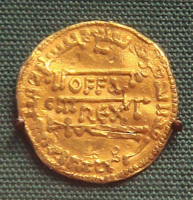 A gold coin with a blundered Arabic inscription and the Latin words OFFA REX across the centre.