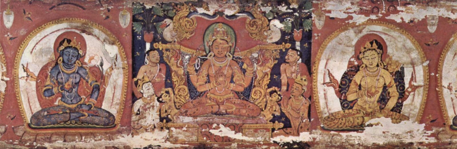 A palm-leaf manuscript painting of a seated goddess between framed panels of deities, in red, blue and gold.