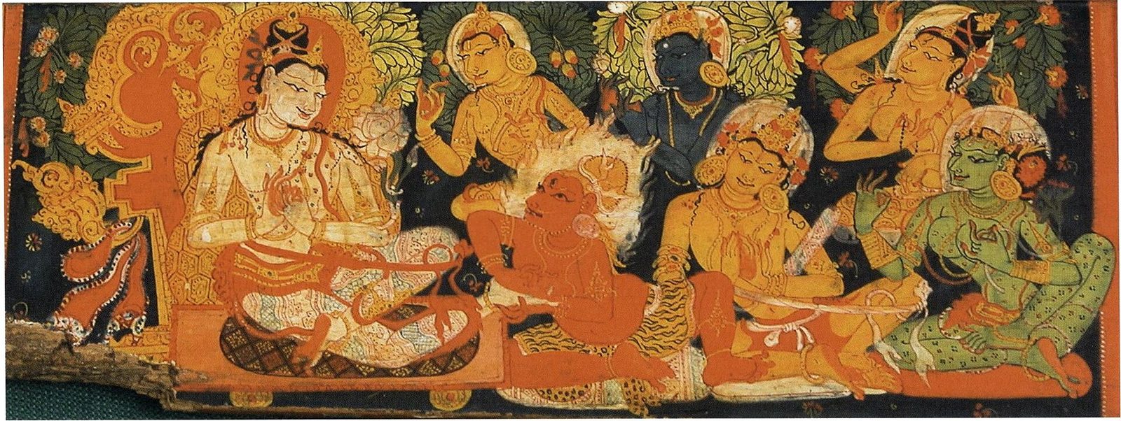 A painted wooden book cover of a bodhisattva teaching an assembly of colourful divinities.