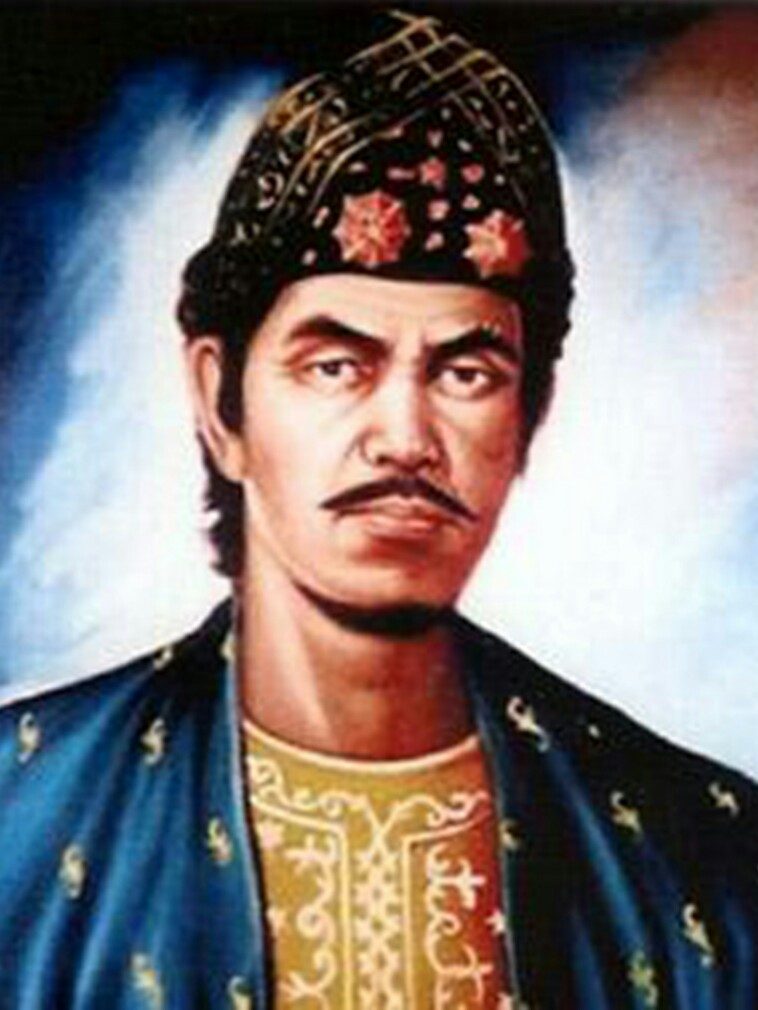 A painted bust-length portrait of a man with a moustache in a high patterned cap and a dark embroidered coat over a gold tunic, against a pale blue ground.