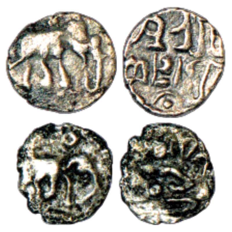 Four small silver coins, two with elephants and two with legends.