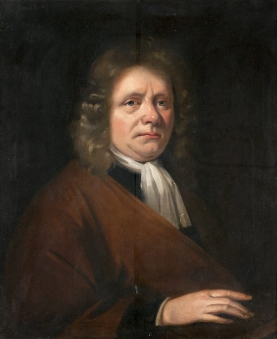 A portrait of a man with long curled hair in a brown gown and white neckcloth.
