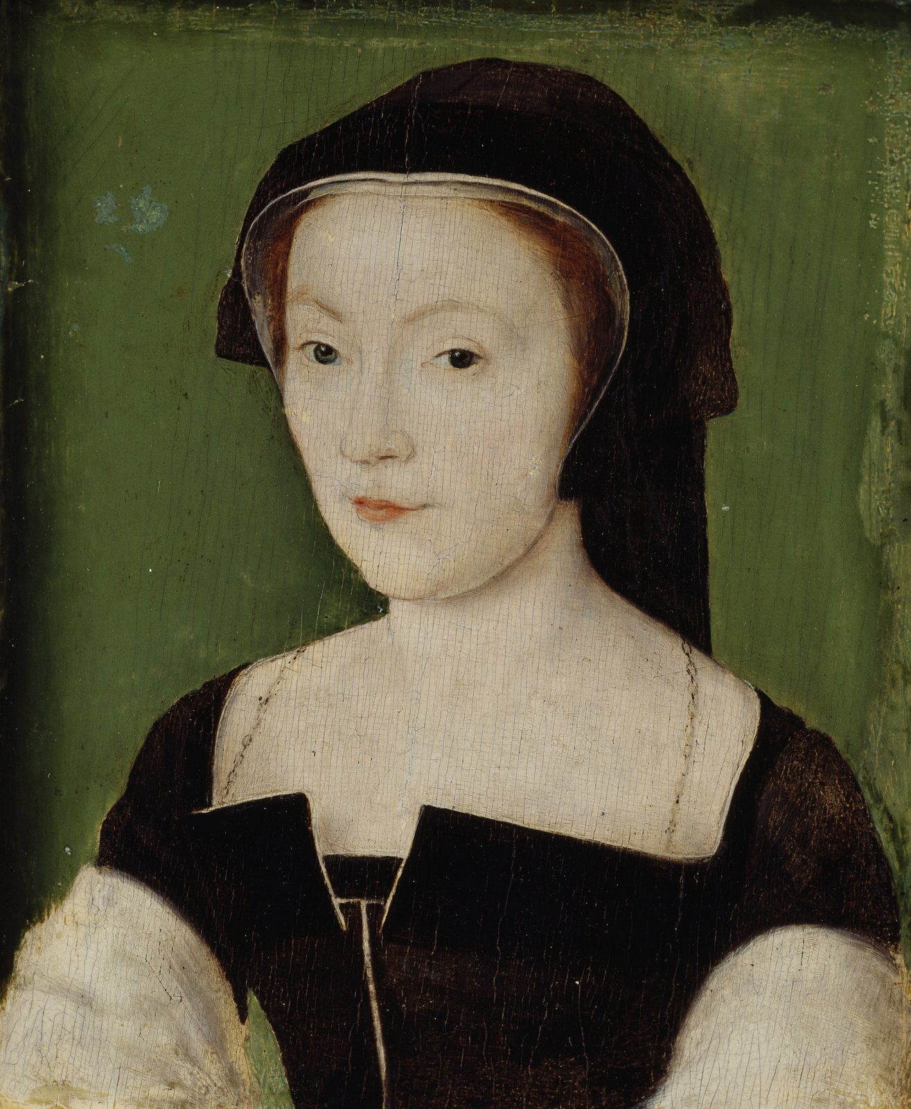 A portrait of a pale young woman in a dark hood and gown against a green background.