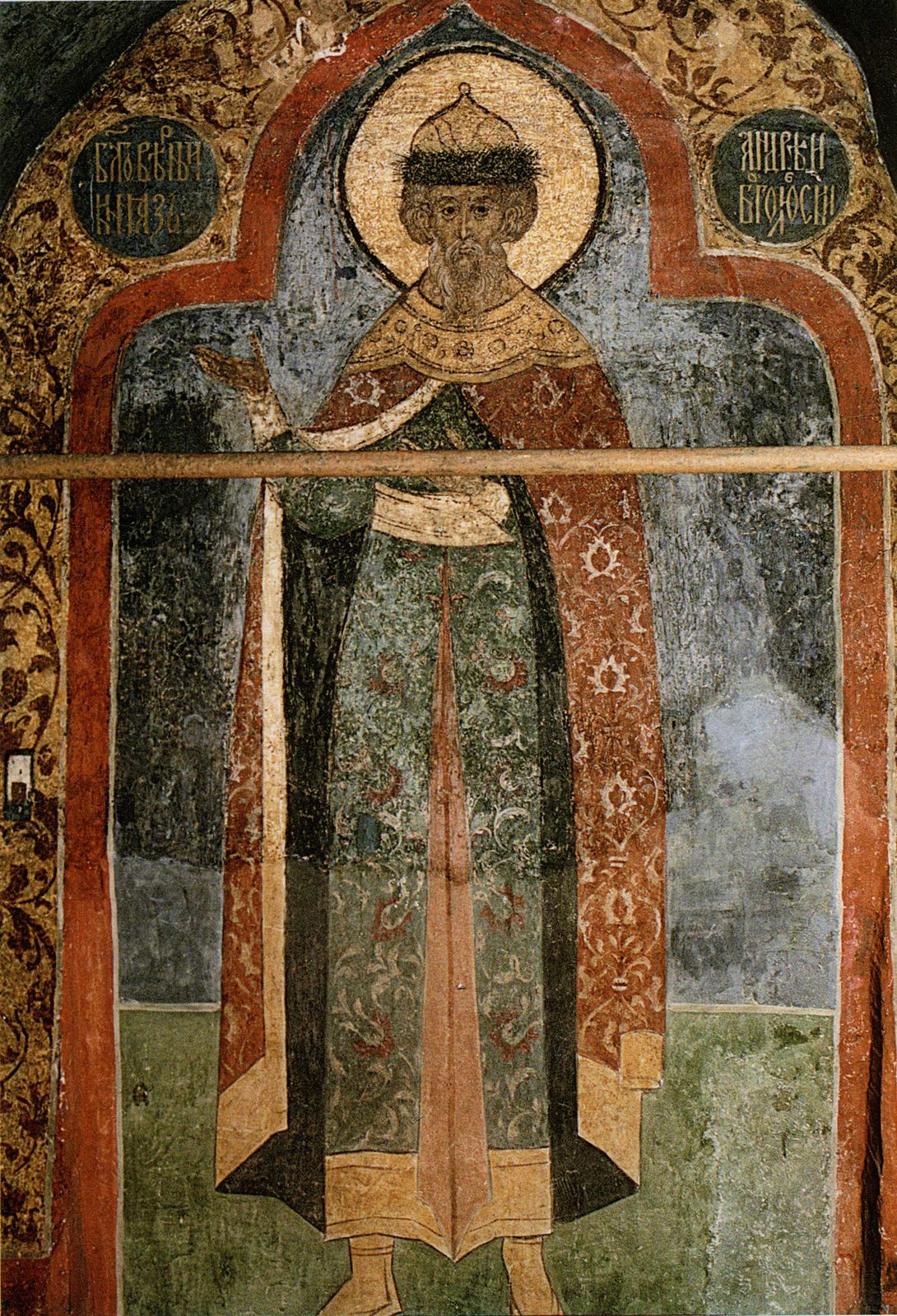 A fresco of a haloed prince in a long patterned robe standing under an arch.