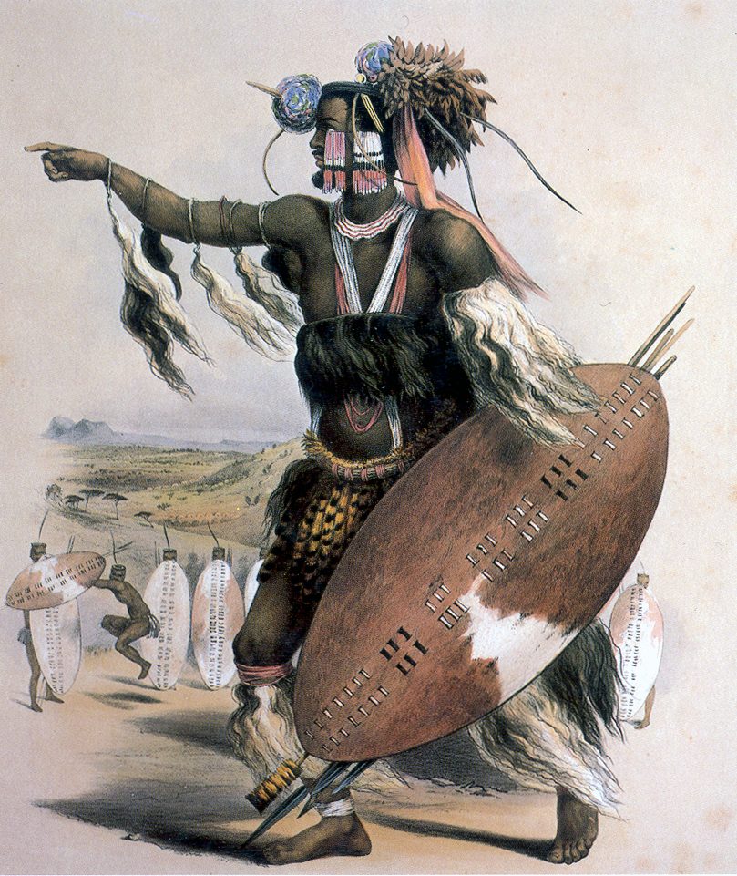 A coloured lithograph of a warrior in a feathered headdress and cowtail fringes, pointing with one arm and holding a large brown-and-white shield, a line of shields behind him.